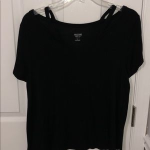 Black tee the hangs off the shoulders
